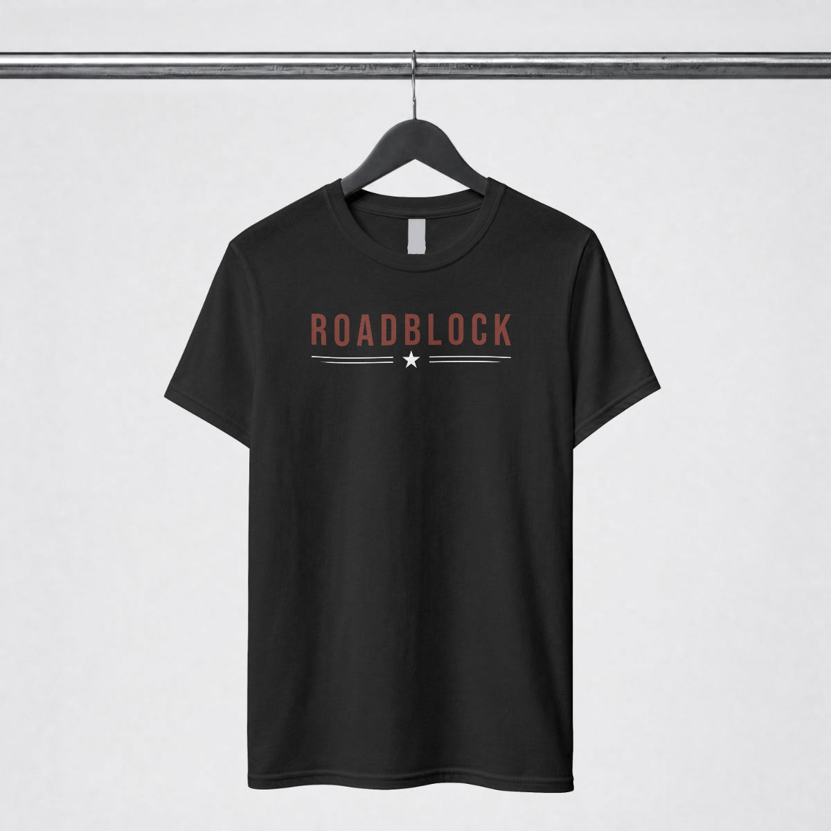 Black shirt with Roadblock as the graphic title across the chest with a single star.
